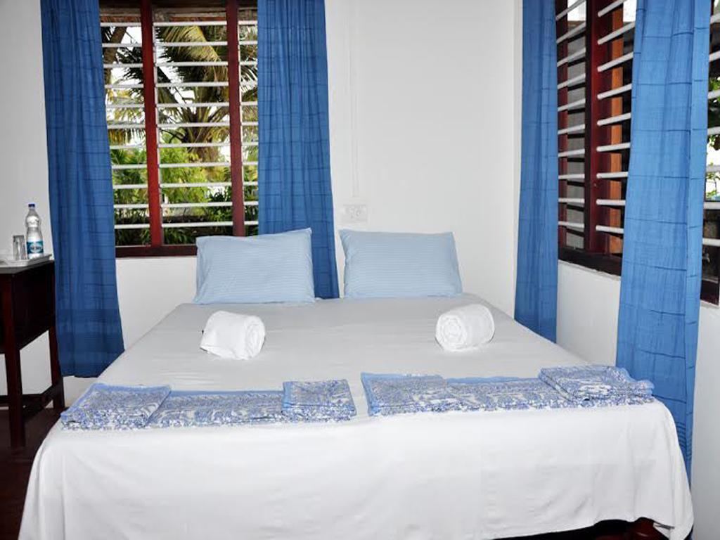 Angeo Beach House Alappuzha Pokoj fotografie